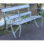 A pale grey painted wooden & wrought-iron garden bench, 48” long (w.a.f.).