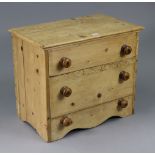 A pine chest commode with a hinged lift-lid, 24½” wide x 20½” high x 15½” deep.