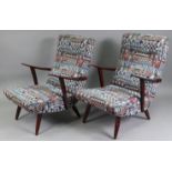 A pair of mid-20th century easy chairs, with buttoned backs & sprung seats upholstered multicoloured