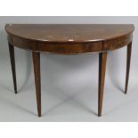 A mahogany demi-lune console table on four square tapered legs, 44¾” wide x 26¾” high x 22¼” deep.