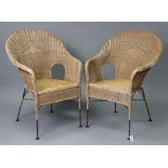 A pair of woven-cane & wrought-iron conservatory chairs.