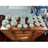 A Wedgwood bone china fifty-seven piece extensive part tea service; & a ditto set of six coffee cans