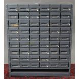 A LIGHT GREY ART-METAL STANDING OFFICE CABINET fitted six ranks of nine drawers, 35¼” wide x 42”