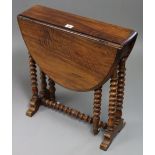 A late 19th/early 20th century walnut Sutherland table with rounded ends & moulded edges to the