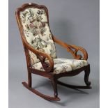 An early 20th century beech-frame rocking chair, with buttoned-back & sprung seat upholstered