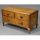 A bird’s-eye maple low chest, fitted two short & one long drawer with turned knob handles, & on