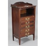 A late 19th/early 20th century inlaid-mahogany sheet-music cabinet with an open recess above five