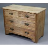 A late Victorian light oak chest fitted two short & two long graduated drawers with steel swing