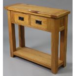 A light oak side table, fitted frieze drawer & on square legs with open undertier, 35¾” wide x 32”