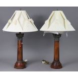 A pair of wooden & brass Corinthian-style column table lamps, with shades, 37½” high.