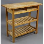 A pine & beech kitchen island on square supports, 39¼” wide x 35½” high x 17¼” deep.