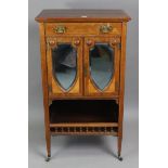 A 19th century inlaid-rosewood upright sheet-music cabinet fitted with a frieze drawer above a