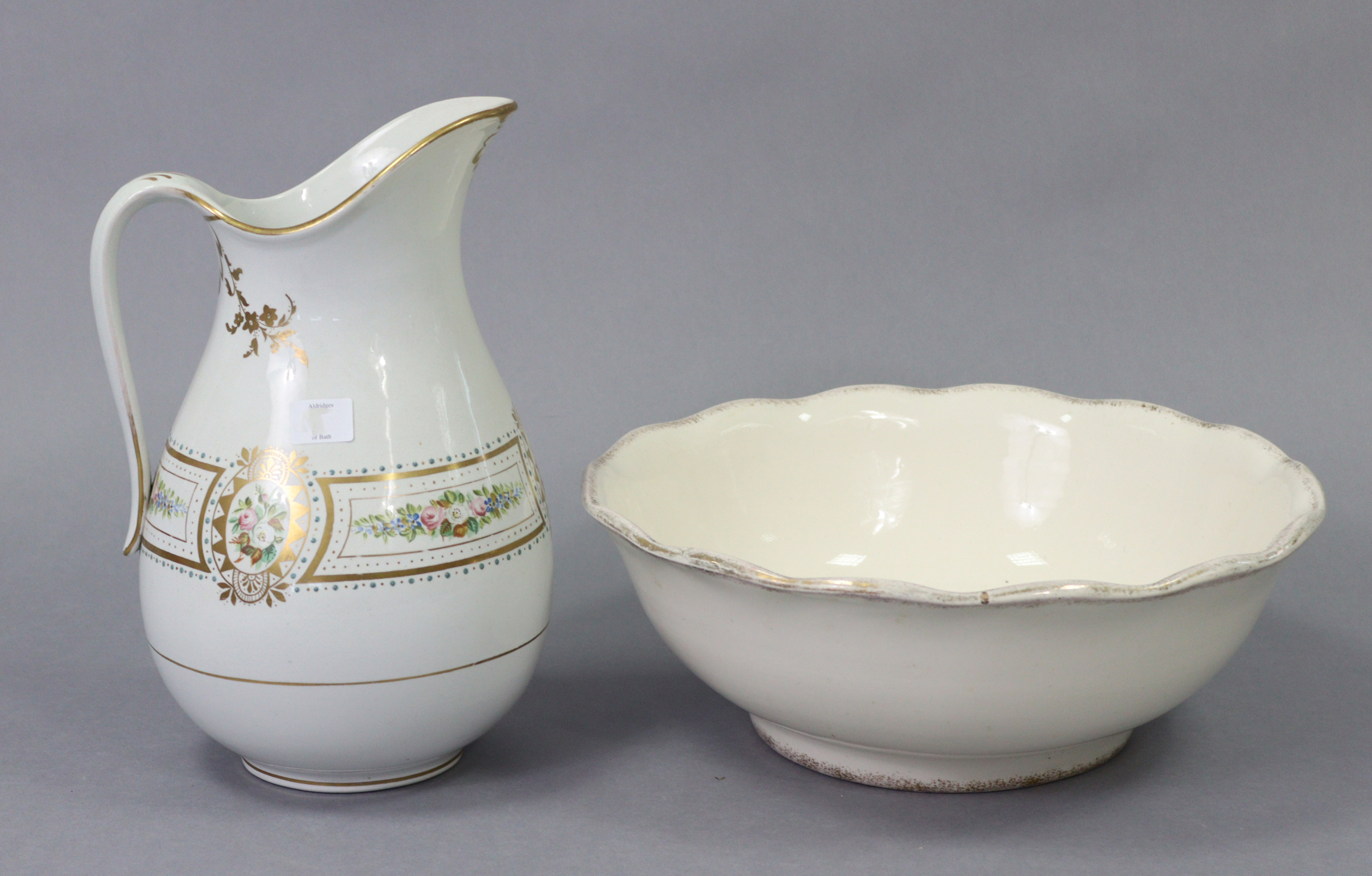 A late Victorian toilet jug & basin of white ground & with multicoloured floral banded decoration. - Bild 2 aus 2