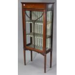 A late 19th century inlaid-mahogany china display cabinet, fitted two shelves enclosed by glazed