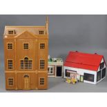 A modern three-storey doll’s house, with opening front, 24½” x 41½” high x 14½” deep; & two modern