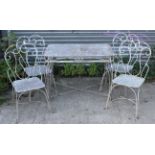 A white painted aluminium & wrought-iron garden table with rectangular top, & on four shaped legs