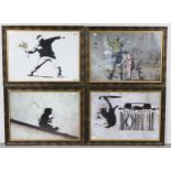 Four coloured prints after Banksy, 16” x 23”, in matching glazed frames.