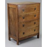 A mid-20th century oak upright chest fitted four long drawers with iron drop handles, 30¼” wide x