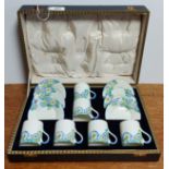 A set of six Royal Doulton “Plaza” coffee cans & saucers, in fitted case.