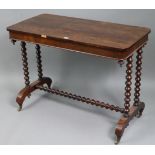 A 19th century rosewood centre table with rounded corners to the rectangular top, & on a pair of