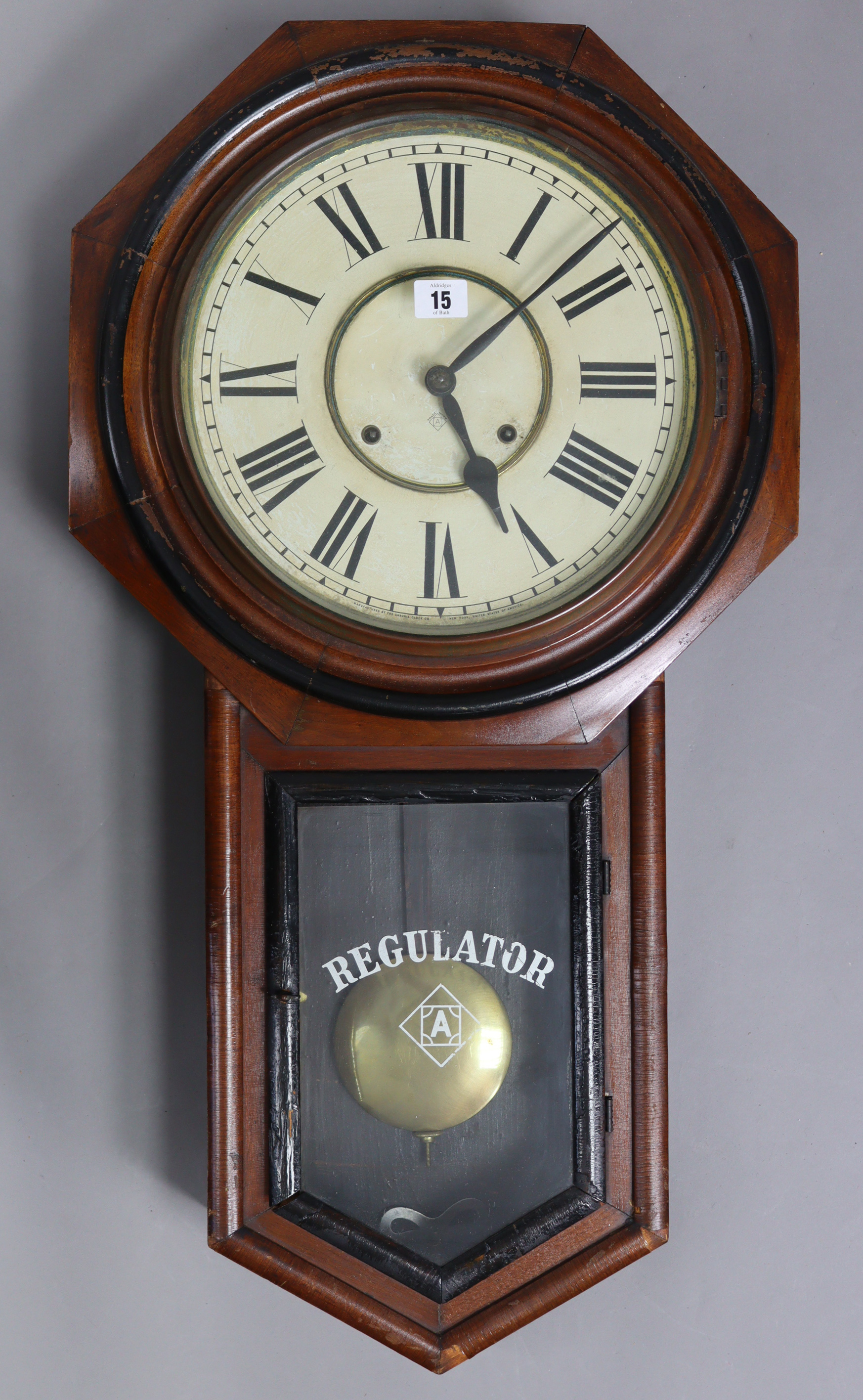 A late 19th/early 20th century American drop-dial regulator wall clock by the Ansonia Clock Co.,