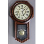A late 19th/early 20th century American drop-dial regulator wall clock by the Ansonia Clock Co.,