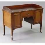 An Edwardian inlaid-mahogany tray-top knee-hole desk, fitted centre frieze drawer flanked by a