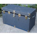 A mid-20th century blue fibre-covered & steel-studded travelling trunk with a hinged lift-lid, 43”