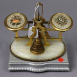 A set of Betjemann’s of London brass & onyx letter scales inset with two floral panels, & complete