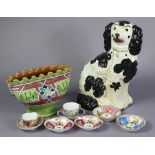 A Staffordshire pottery flat-back spaniel ornament, 10½” high; an eastern-style pottery vase; two