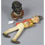 A 1930’s “Sunny Jim” Wheat Flakes advertising doll, 16” tall; & a painted cast-iron “Jolly Nigger”