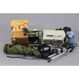 A Kowa “TSN-922” spotting scope; a Toguard “H45” digital wildlife camera, boxed; three other