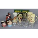 A Bell's scotch whisky winter warmer gift pack; two ditto bar jugs; three various character & toby