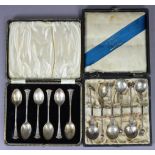 A set of six George V silver teaspoons with stylised finials Birmingham 1932, & a set of six