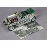 A Franklin Mint scale model of a 1907 Rolls Royce Silver Ghost car, boxed.