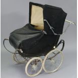 An early 20th century coach-built pram/perambulator (black) with spoke wheel, 45” long.