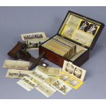 Approximately one hundred various vintage stereoview cards; & a vintage stereo-card viewer.