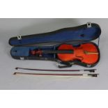 A Chinese violin & two bows (violin 23¾” long), with case.