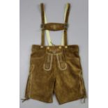 A pair of German lederhosen’s; an Elkington plate matchbox/ashtray; a floral decorated jug, etc.