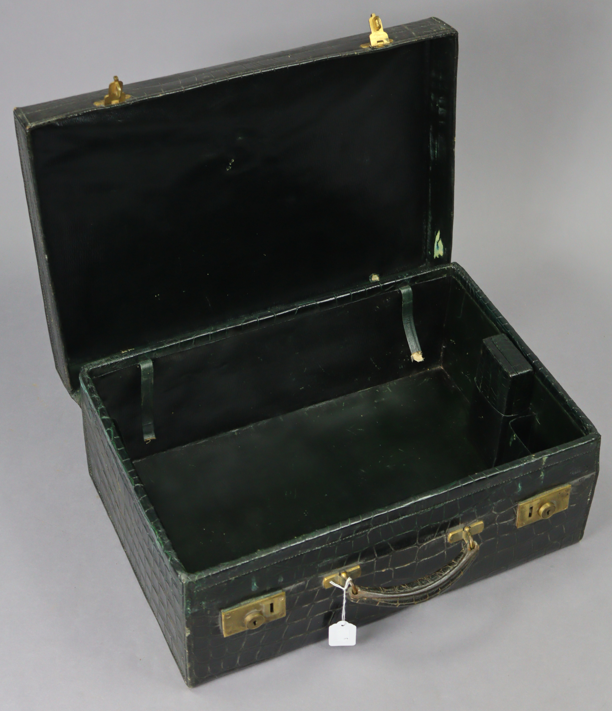 A late 19th/early 20th century dark green finish crocodile-skin suitcase with brass twin-lever - Image 3 of 5