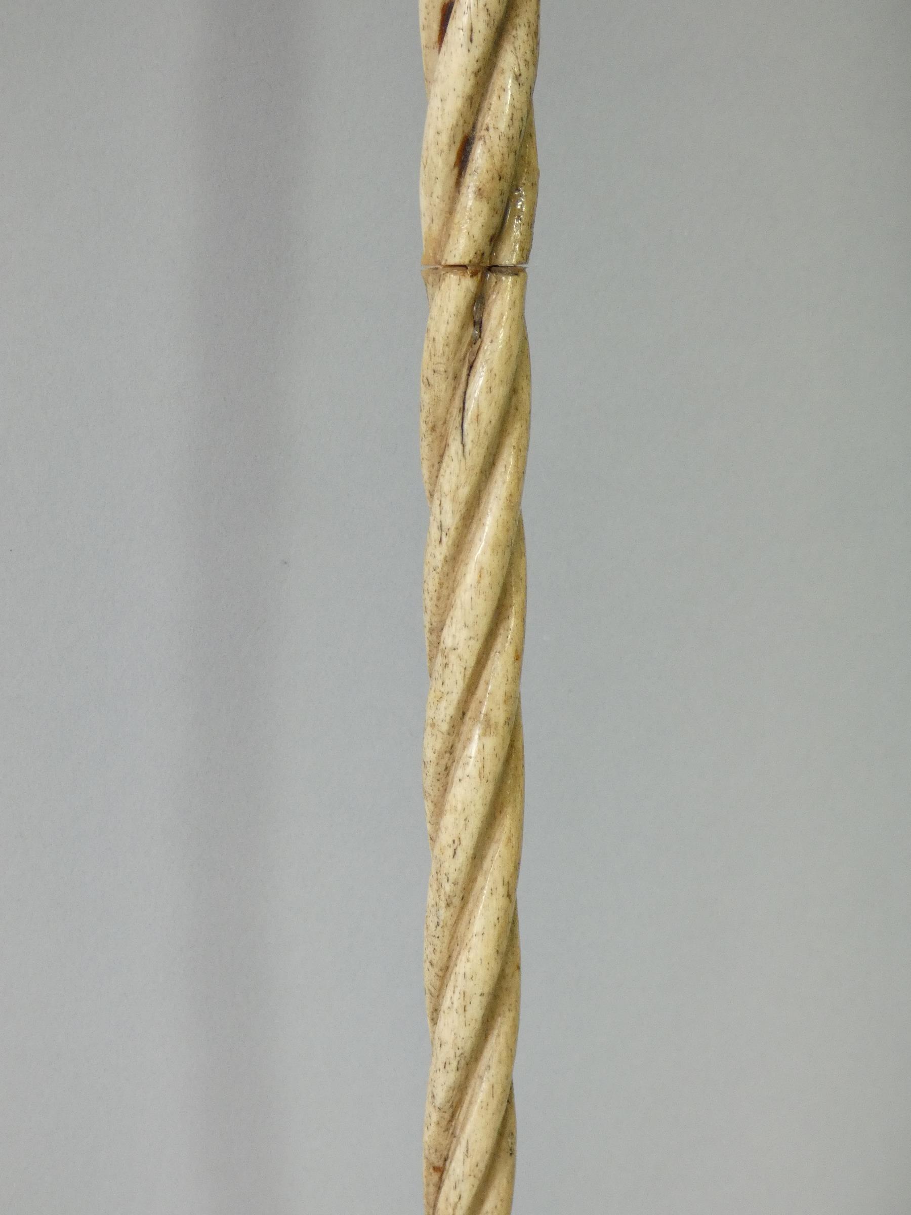 A 19th century whale jaw-bone & ivory-handled walking stick carved with a fist clutching a - Image 6 of 7