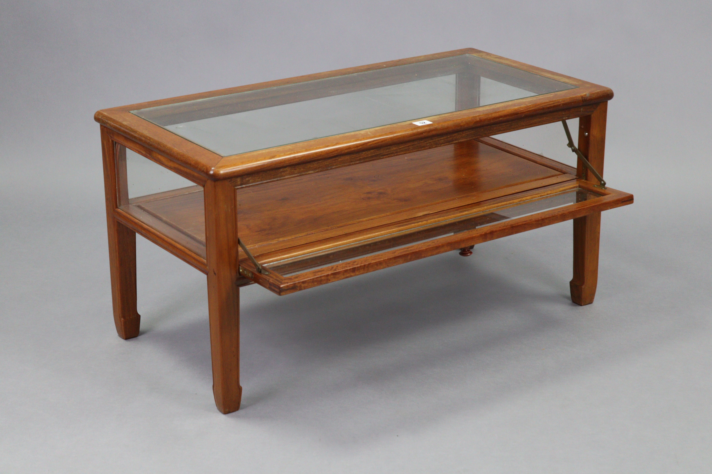 A Chinese rosewood display-top coffee table inset plate-glass to the rectangular top, enclosed by - Image 2 of 2