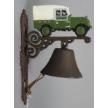 A modern painted cast-iron house bell with Land Rover surmount, 13” high.