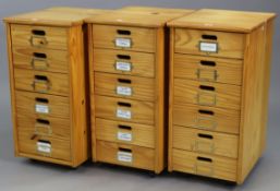 A set of three pine small upright cabinets, each fitted six drawers, 14” wide x 28” high x 17­­½”