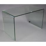 A tempered glass desk with rectangular top & on square end supports, 47½” wide x 29¾” high x 27½”