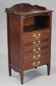 A late 19th/early 20th century inlaid-mahogany sheet-music cabinet with an open recess above five