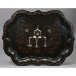 An early Victorian black papier-mâché large rectangular tray, with wide cut-card edge & gilt