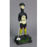 A reproduction painted cast-iron “Guinness” advertising figure, 14¼” high.