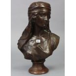 A bronzed composition female bust, 22” high.