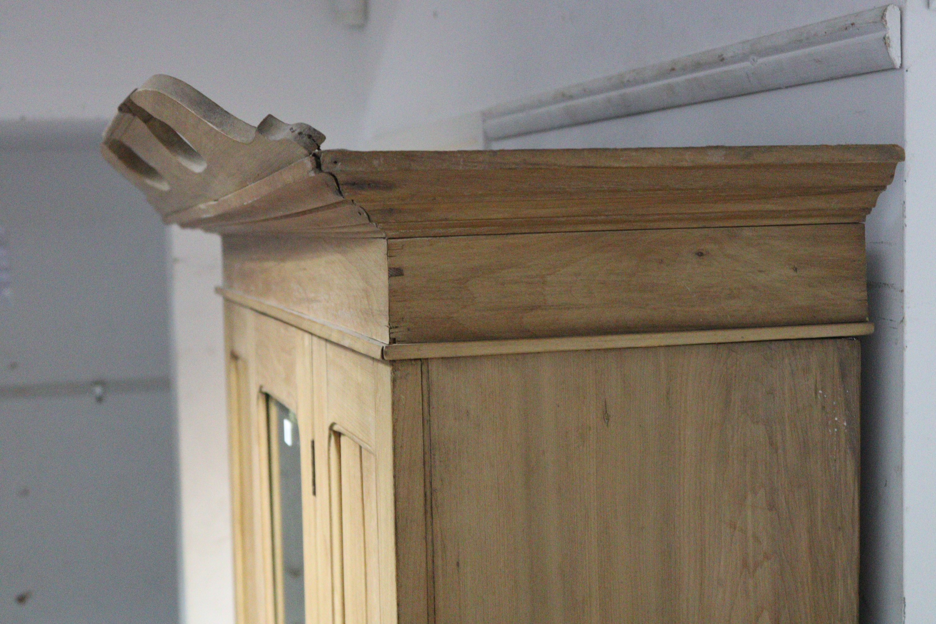 A late Victorian bleached walnut wardrobe with moulded cornice, enclosed by a rectangular bevelled - Image 4 of 9